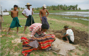 n the village of Tanyukone, residents on Saturday buried a 6-year-old boy who died of a fever in the aftermath of the cyclone that devastated Burma. Photo: New York Times