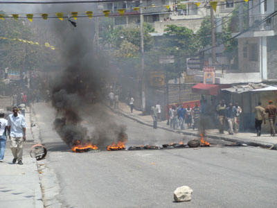 Frustrated with the soaring price of food, Haitians took to the streets in protest in early April. Photo: CRS 