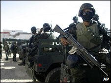 Soldiers moved into Ciudad Juarez to try to regain control of a city in which more than 2,000 people have been murdered over the past year.  Officials say they intend to have 7,000 troops and police in position by the end of the week. Photo: Associated Press