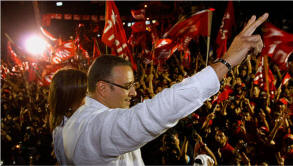 Mauricio Funes greeted his supporters in San Salvador on Sunday night after winning El Salvador�s presidential election. Luis Romero/Associated Press