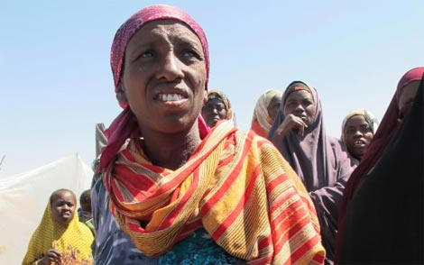 Sarah Mohammed, who is eight months pregnant, plans to deliver inside her tent in Galkayo, Somalia, because there is no nearby hospital. Mohammed fled Mogadishu several months ago after watching an explosion tear apart her cousin. Photo:Sudarsan Raghavan/Washington Post