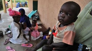 Malnourished children outside hospital in Gao, Mali. World Vision and Save the Children say that millions of families in the Sahel region are suffering in what is effectively a large-scale nutrition crisis. They say the main reason is not drought or food deficit, but a lack of protection against shock price rises. Photo: AFP