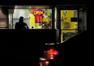 Photo of man drinking coffee at a diiner in the early morning. The ranks of the so-called working poor have grown even as the nation is showing signs of shaking off the worst effects of the recession. &nbsp;Photo: Michael S Williamson/Washington Post