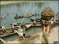 The National Rural Employment Guarantee scheme was launched in February last year to provide employment to millions of people in India's poorest villages to work on building local infrastructure like village roads, small dams, ponds and buildings. Photo: AFP
