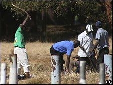 On Sunday, the MDC was due to stage a rally in Harare, but supporters of Mr Mugabe's Zanu-PF occupied the stadium venue and roads leading up to it. Witnesses reported seeing hundreds of youths around the venue wielding sticks, some chanting slogans, and others circling the stadium crammed onto the backs of trucks. Some set upon opposition activists, leaving a number badly injured. Photo: AP 