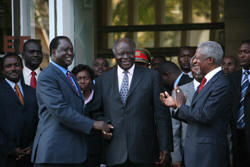 President Mwai Kibaki shakes hands with opposition leader Raila Odinga in the presence of former UN Secretary-General Kofi Annan. Photo: Boniface Mwangi/IRIN