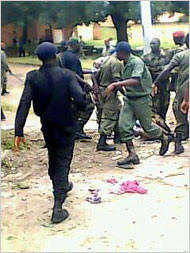 n a cellphone photograph given to The New York Times, soldiers surrounded a woman on the ground on Sept. 28 in Conakry, Guinea. Several images appear to show attacks on women.