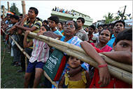 A rally in a West Bengal village for Mamata Banerjee, who has usurped the Communists and cast herself as the savior of the poor. Photo: Ruth Fremson/The New York Times
