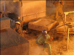 The Indian-owned Konkola Copper Mines in Zambia employs more than 12,000 people, but it plans to lay off nearly 1,100 to cut costs. The mining industry employs 10 percent of Zambia's workforce. Photo: Karin Brulliard/Washington Post)