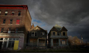 Shuttered homes and businesses in downtown Detroit, Michigan. Meredith Whitney, the US research analyst who correctly predicted the global credit crunch, described local and state debt, as one of the two biggest problems, along with the housing market,  facing the US economy, and one that could derail its recovery. Photograph: Spencer Platt/Getty Images