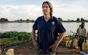 John Prendergast on the banks of the White Nile in southern Sudan. Marco Di Lauro/Reportage, for The New York Times&nbsp;