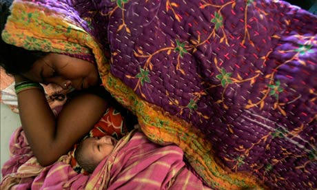 A destitute woman with her newborn baby.