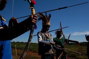 Guarani indigenous boys took part in a religious ceremony in Mato Grosso do Sul, on the Brazilian side near the Paraguayan border. Killings and disappearances of indigenous leaders in Brazil continue to climb, leaving a stain on the nation’s rise as an agricultural powerhouse. Photo: Maurico Lima/New York Times