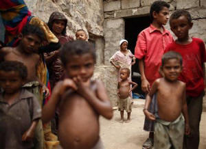 Children gather in a poor neighbourhood in the Mawzaa village of the southern Yemeni province of Taiz July 1, 2012. Photo: Reuters/Khaled Abdullah 