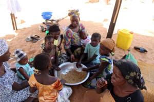 Ndeye Diagne seated, with her children. � Always my children are hungry." Photo: Jennifer Lazuta/IRIN