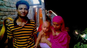 Al-Amin and Fatima outside their new home in a slum in Dhaka. Photo: Mubashar Hasan/IRIN &nbsp;