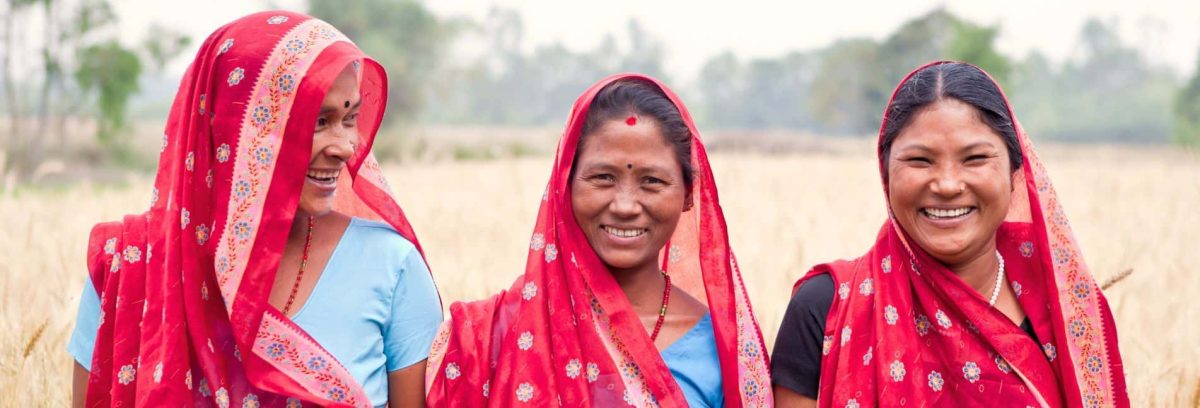 Three Hindi women who escaped extreme poverty.