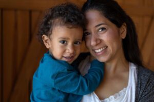 Mother and child smiling